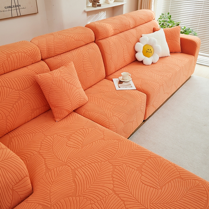 91家纺网 家纺一手货源 找家纺 丝绮鹿 2025新款雕花绒大叶子沙发套松紧款（贵妃图） 橙色