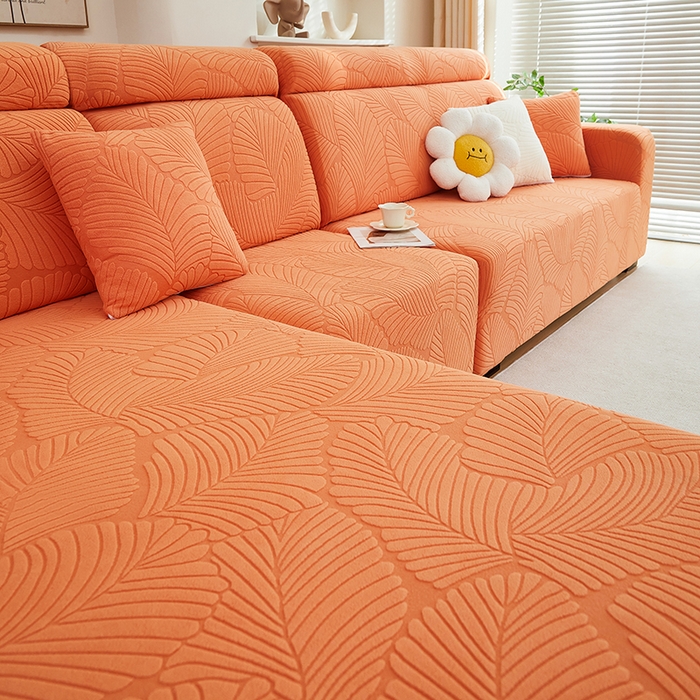 91家纺网 家纺一手货源 找家纺 丝绮鹿 2025新款雕花绒大叶子沙发套松紧款（贵妃图） 橙色