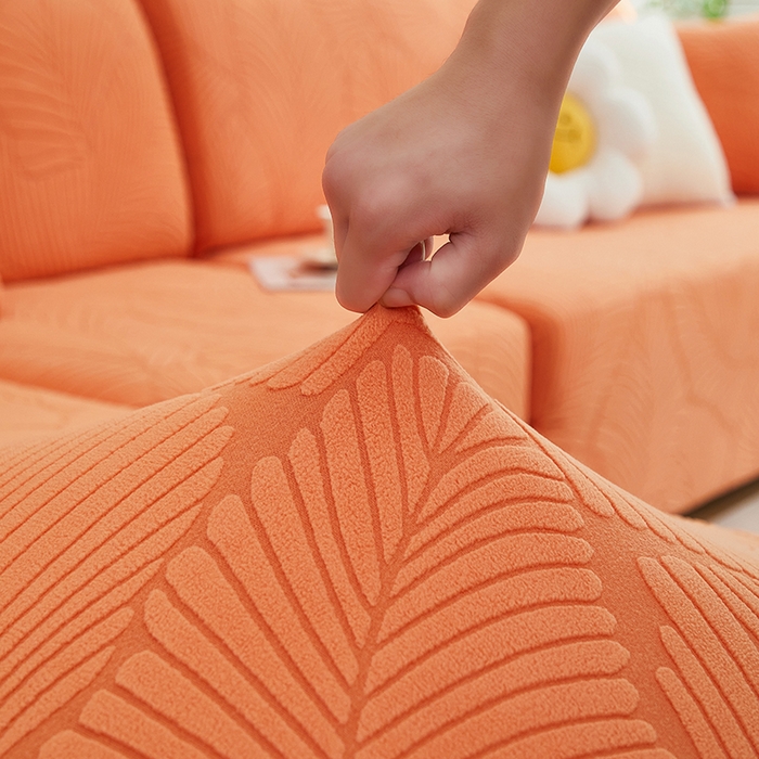91家纺网 家纺一手货源 找家纺 丝绮鹿 2025新款雕花绒大叶子沙发套松紧款（贵妃图） 橙色