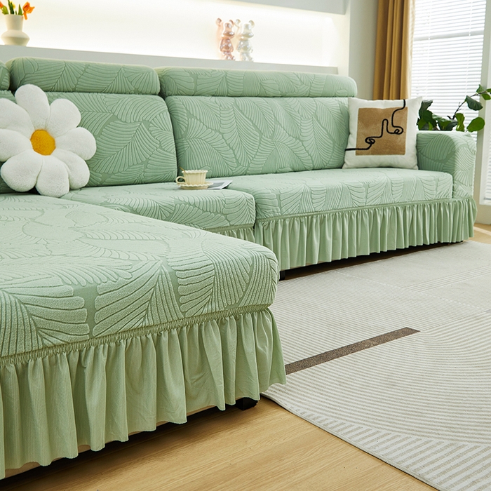91家纺网 家纺一手货源 找家纺 丝绮鹿 2025新款雕花绒大叶子沙发套裙边款（贵妃图） 大叶子薄荷绿