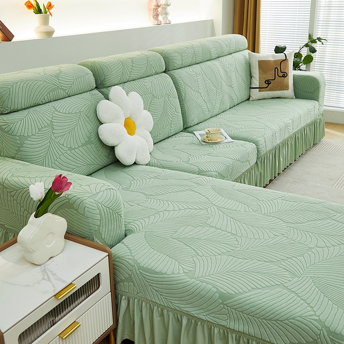 91家纺网 家纺一手货源 找家纺 丝绮鹿 2025新款雕花绒大叶子沙发套裙边款（贵妃图） 大叶子薄荷绿