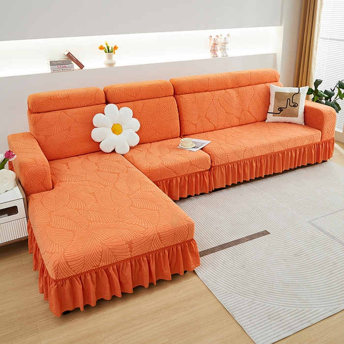 91家纺网 家纺一手货源 找家纺 丝绮鹿 2025新款雕花绒大叶子沙发套裙边款（贵妃图） 大叶子橙色