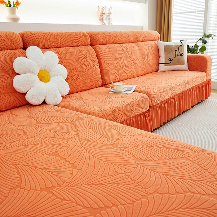 91家纺网 家纺一手货源 找家纺 丝绮鹿 2025新款雕花绒大叶子沙发套裙边款（贵妃图） 大叶子橙色