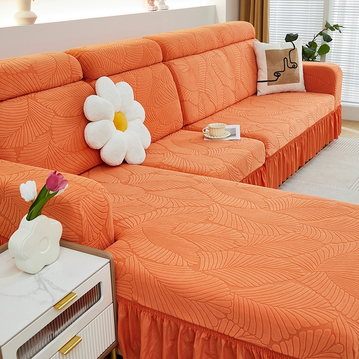 91家纺网 家纺一手货源 找家纺 丝绮鹿 2025新款雕花绒大叶子沙发套裙边款（贵妃图） 大叶子橙色