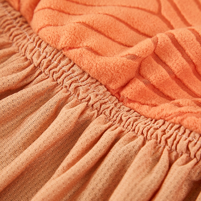 91家纺网 家纺一手货源 找家纺 丝绮鹿 2025新款雕花绒大叶子沙发床裙边款 橘色