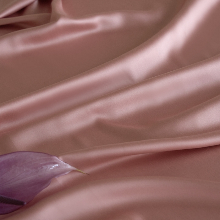 91家纺网 家纺一手货源 找家纺 沐晴家纺 2025新款60纯色兰精天丝休闲盖毯嵌绳工艺天丝毯-风格二 桃之夭夭