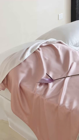 91家纺网 家纺一手货源 找家纺 沐晴家纺 2025新款60纯色兰精天丝休闲盖毯嵌绳工艺天丝毯-风格二 桃之夭夭