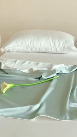 91家纺网 家纺一手货源 找家纺 沐晴家纺 2025新款60纯色兰精天丝休闲盖毯嵌绳工艺天丝毯-风格一 绿野仙踪