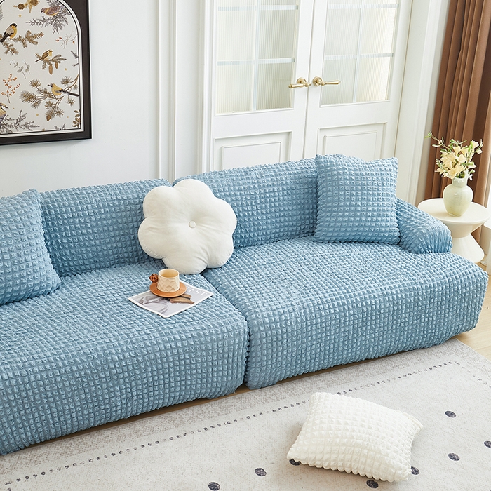 91家纺网 家纺一手货源 找家纺 丝绮鹿 2025新款泡泡爆米花系列—直排松紧款沙发套 湖蓝