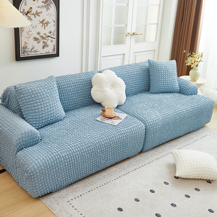 91家纺网 家纺一手货源 找家纺 丝绮鹿 2025新款泡泡爆米花系列—直排松紧款沙发套 湖蓝