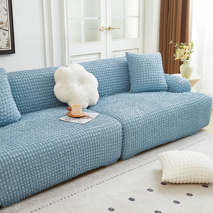 91家纺网 家纺一手货源 找家纺 丝绮鹿 2025新款泡泡爆米花系列—直排松紧款沙发套 湖蓝