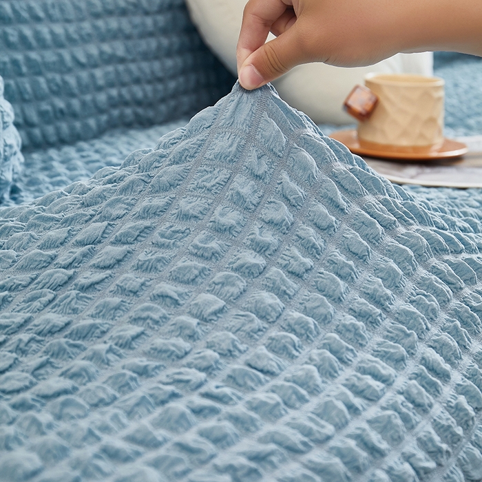 91家纺网 家纺一手货源 找家纺 丝绮鹿 2025新款泡泡爆米花系列—直排松紧款沙发套 湖蓝