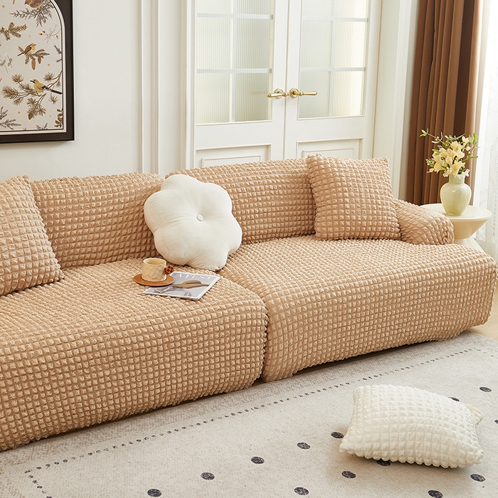 91家纺网 家纺一手货源 找家纺 丝绮鹿 2025新款泡泡爆米花系列—直排松紧款沙发套 米黄
