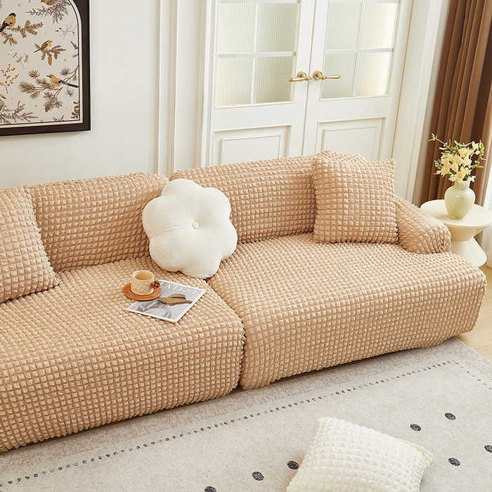 91家纺网 家纺一手货源 找家纺 丝绮鹿 2025新款泡泡爆米花系列—直排松紧款沙发套 米黄