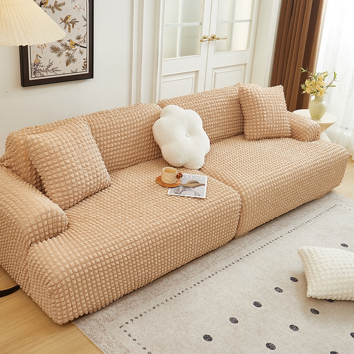 91家纺网 家纺一手货源 找家纺 丝绮鹿 2025新款泡泡爆米花系列—直排松紧款沙发套 米黄