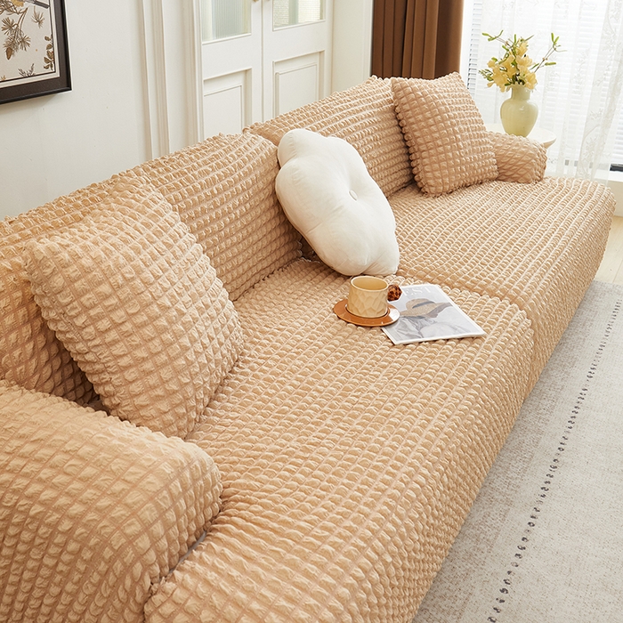 91家纺网 家纺一手货源 找家纺 丝绮鹿 2025新款泡泡爆米花系列—直排松紧款沙发套 米黄
