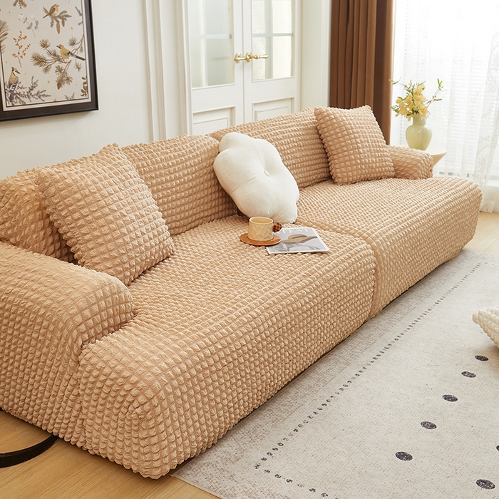 91家纺网 家纺一手货源 找家纺 丝绮鹿 2025新款泡泡爆米花系列—直排松紧款沙发套 米黄