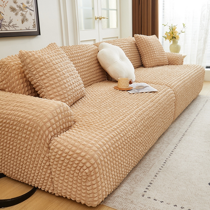 91家纺网 家纺一手货源 找家纺 丝绮鹿 2025新款泡泡爆米花系列—直排松紧款沙发套 米黄