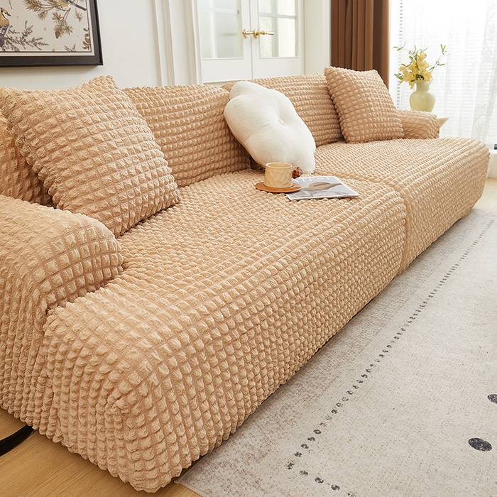 91家纺网 家纺一手货源 找家纺 丝绮鹿 2025新款泡泡爆米花系列—直排松紧款沙发套 米黄