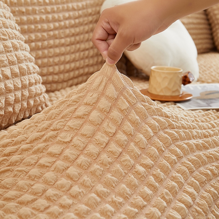 91家纺网 家纺一手货源 找家纺 丝绮鹿 2025新款泡泡爆米花系列—直排松紧款沙发套 米黄