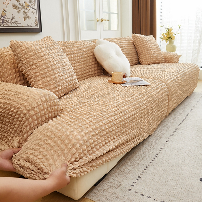 91家纺网 家纺一手货源 找家纺 丝绮鹿 2025新款泡泡爆米花系列—直排松紧款沙发套 米黄