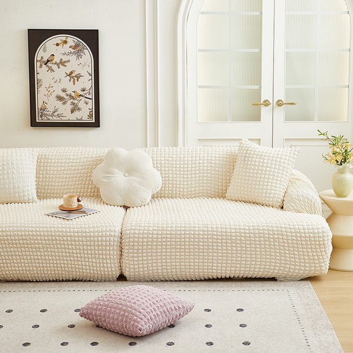 91家纺网 家纺一手货源 找家纺 丝绮鹿 2025新款泡泡爆米花系列—直排松紧款沙发套 乳白