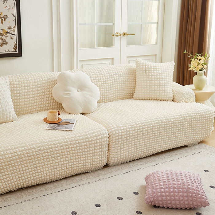 91家纺网 家纺一手货源 找家纺 丝绮鹿 2025新款泡泡爆米花系列—直排松紧款沙发套 乳白