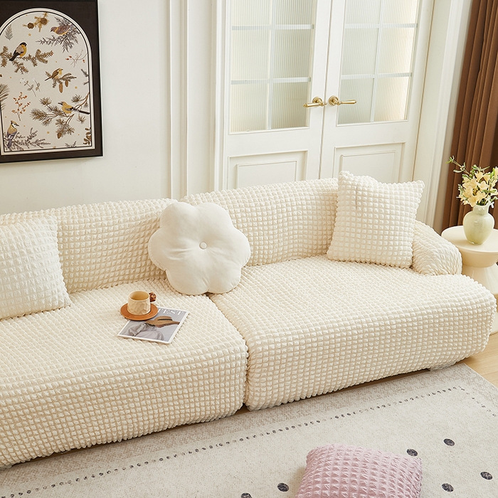 91家纺网 家纺一手货源 找家纺 丝绮鹿 2025新款泡泡爆米花系列—直排松紧款沙发套 乳白