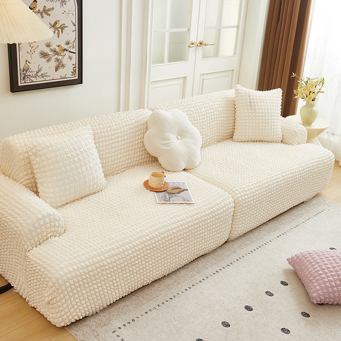 91家纺网 家纺一手货源 找家纺 丝绮鹿 2025新款泡泡爆米花系列—直排松紧款沙发套 乳白