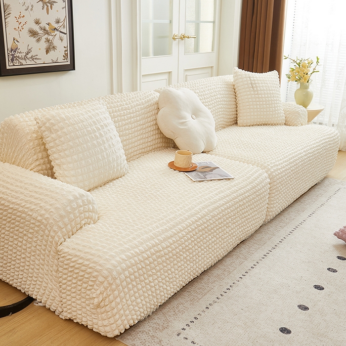 91家纺网 家纺一手货源 找家纺 丝绮鹿 2025新款泡泡爆米花系列—直排松紧款沙发套 乳白