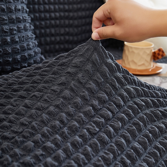 91家纺网 家纺一手货源 找家纺 丝绮鹿 2025新款泡泡爆米花系列—直排松紧款沙发套 碳灰