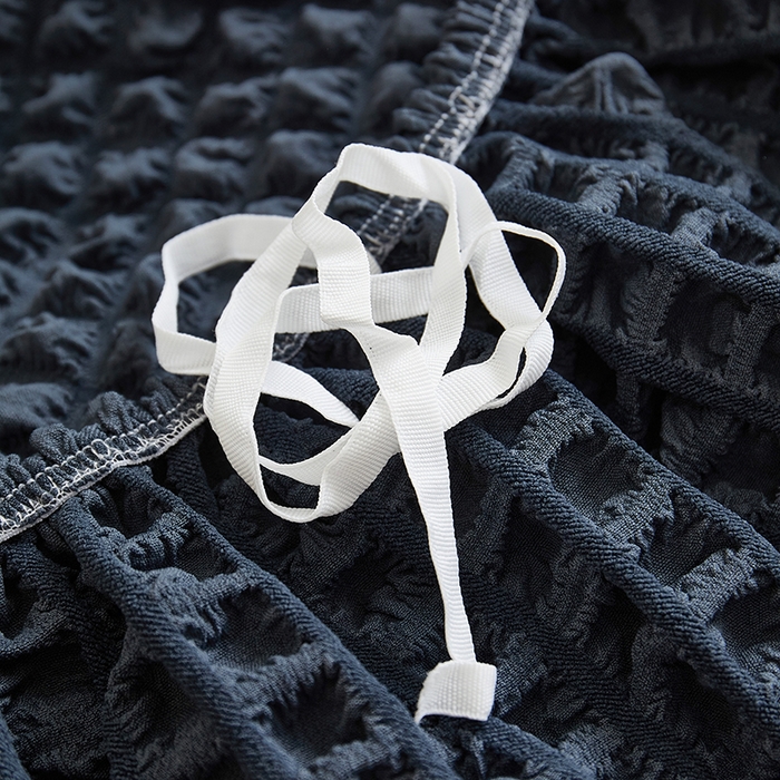 91家纺网 家纺一手货源 找家纺 丝绮鹿 2025新款泡泡爆米花系列—直排松紧款沙发套 碳灰