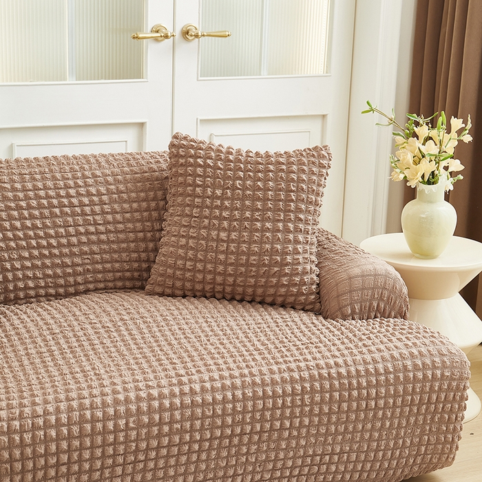 91家纺网 家纺一手货源 找家纺 丝绮鹿 2025新款泡泡爆米花系列—直排松紧款沙发套 驼色