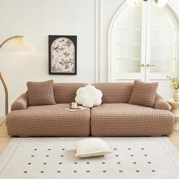 91家纺网 家纺一手货源 找家纺 丝绮鹿 2025新款泡泡爆米花系列—直排松紧款沙发套 驼色