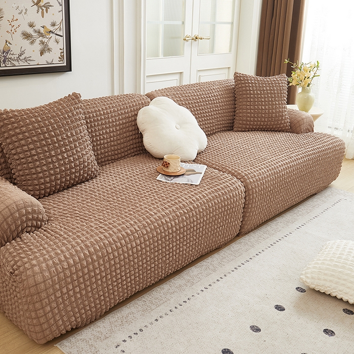 91家纺网 家纺一手货源 找家纺 丝绮鹿 2025新款泡泡爆米花系列—直排松紧款沙发套 驼色