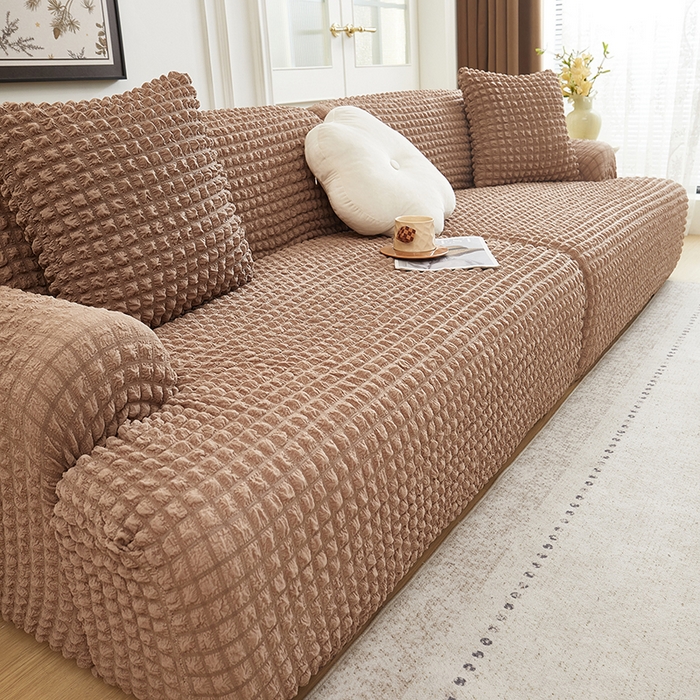 91家纺网 家纺一手货源 找家纺 丝绮鹿 2025新款泡泡爆米花系列—直排松紧款沙发套 驼色