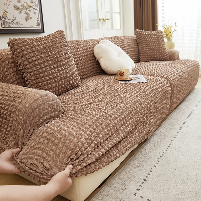 91家纺网 家纺一手货源 找家纺 丝绮鹿 2025新款泡泡爆米花系列—直排松紧款沙发套 驼色