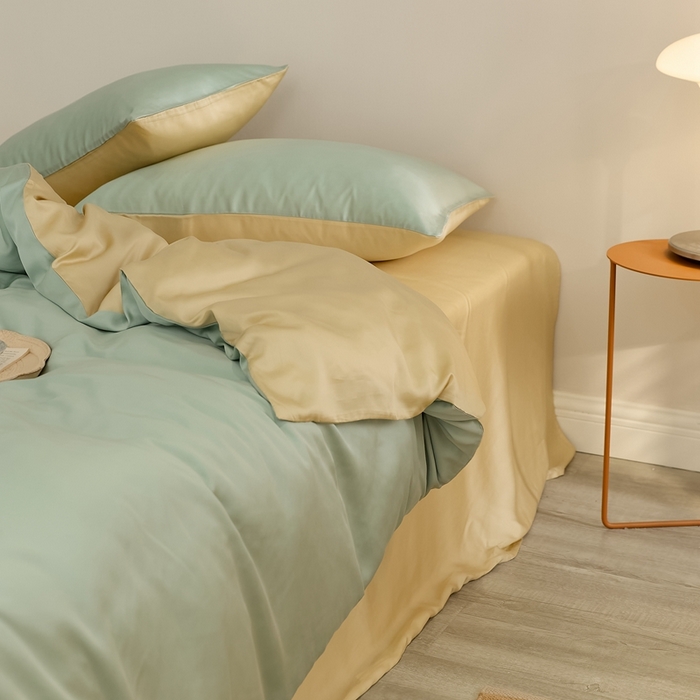 91家纺网 家纺一手货源 找家纺 2025新款A类奥地利进口60支兰精天丝莱赛尔轻奢纯色双拼四件套 浅艾绿-香槟金