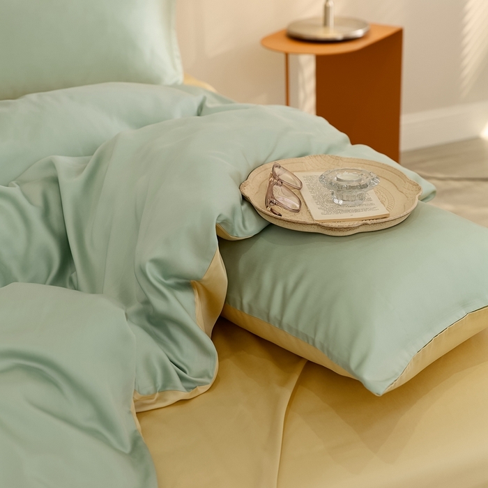 91家纺网 家纺一手货源 找家纺 2025新款A类奥地利进口60支兰精天丝莱赛尔轻奢纯色双拼四件套 浅艾绿-香槟金