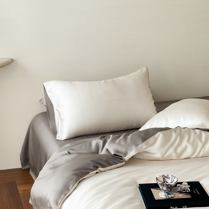 91家纺网 家纺一手货源 找家纺 2025新款A类奥地利进口60支兰精天丝莱赛尔轻奢纯色双拼四件套 乳蛋白-冷岩灰