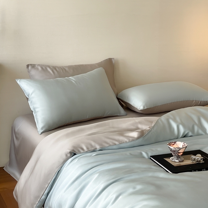 91家纺网 家纺一手货源 找家纺 2025新款A类奥地利进口60支兰精天丝莱赛尔轻奢纯色双拼四件套 映霜蓝-霜华银