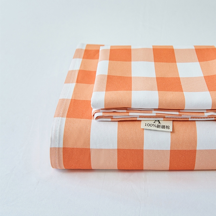 91家纺网 家纺一手货源 找家纺 义博家纺 2025新款纯棉老粗布床单 夏日橙中格