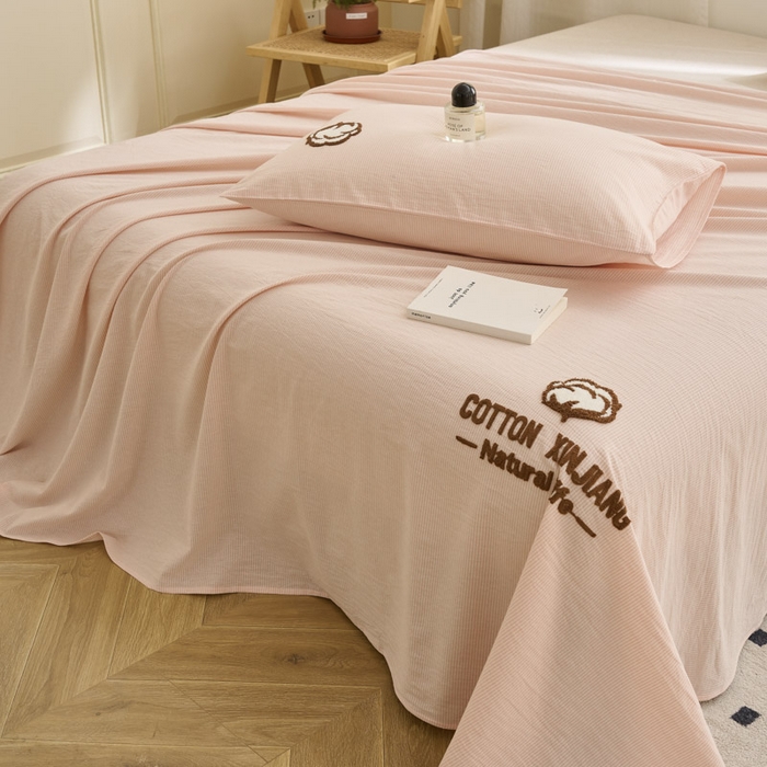 91家纺网 家纺一手货源 找家纺 早晨家纺 2025新款色织纯棉水洗棉毛巾绣床单 流年床单-浅粉