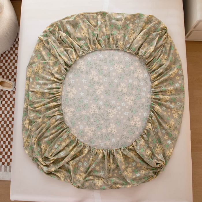 91家纺网 家纺一手货源 找家纺 贝兰仙奴 2025春夏新款全棉纯棉12868印花单床笠 床笠单件 月晚花庭绿