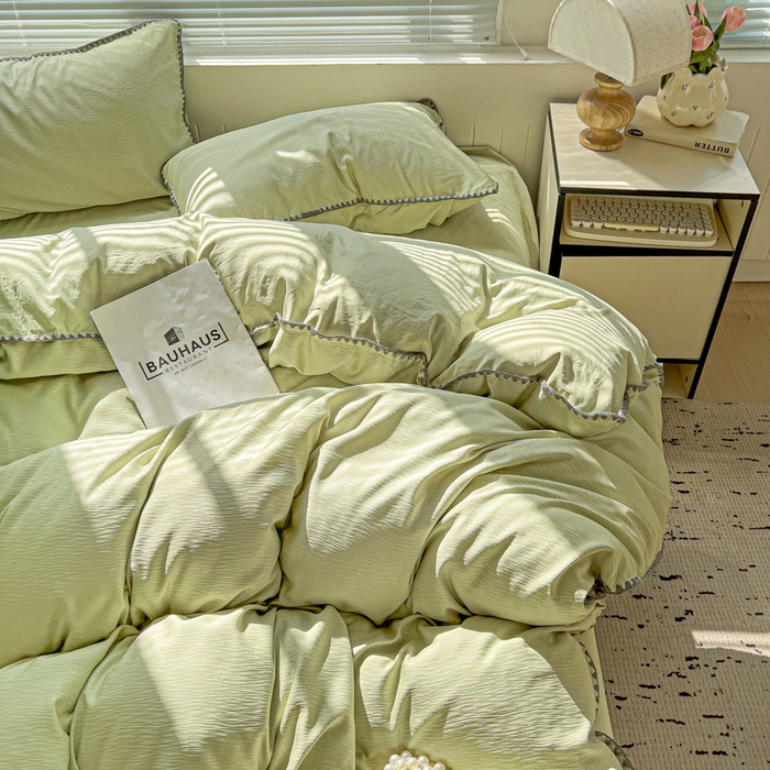 91家纺网 家纺一手货源 找家纺 卡普家居 2025新款A类轻奢贝壳绣丝柔缎提花枕套 丝柔缎-黄绿