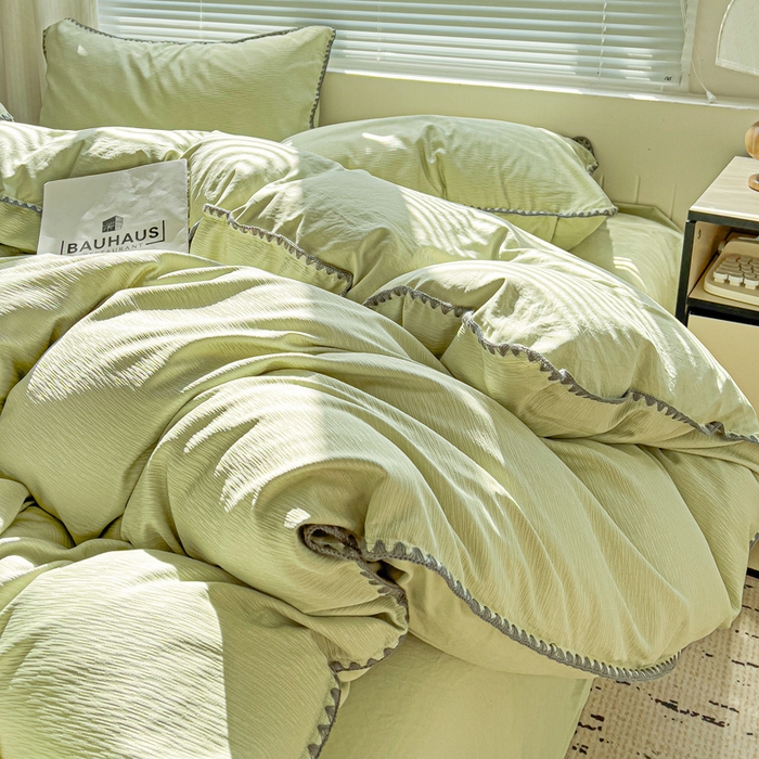 91家纺网 家纺一手货源 找家纺 卡普家居 2025新款A类轻奢贝壳绣丝柔缎提花枕套 丝柔缎-黄绿