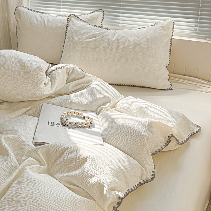 91家纺网 家纺一手货源 找家纺 卡普家居 2025新款A类轻奢贝壳绣丝柔缎提花枕套 丝柔缎-奶白