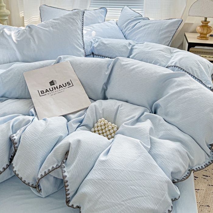 91家纺网 家纺一手货源 找家纺 卡普家居 2025新款A类轻奢贝壳绣丝柔缎提花枕套 丝柔缎-浅兰