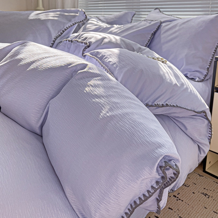 91家纺网 家纺一手货源 找家纺 卡普家居 2025新款A类轻奢贝壳绣丝柔缎提花枕套 丝柔缎-浅紫