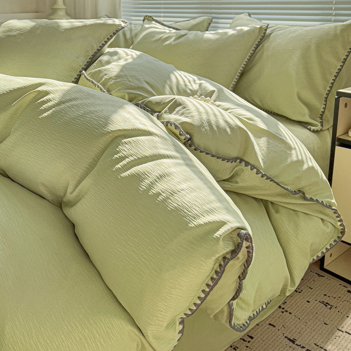 91家纺网 家纺一手货源 找家纺 卡普家居 2025新款A类轻奢贝壳绣丝柔缎提花四件套 丝柔缎-黄绿